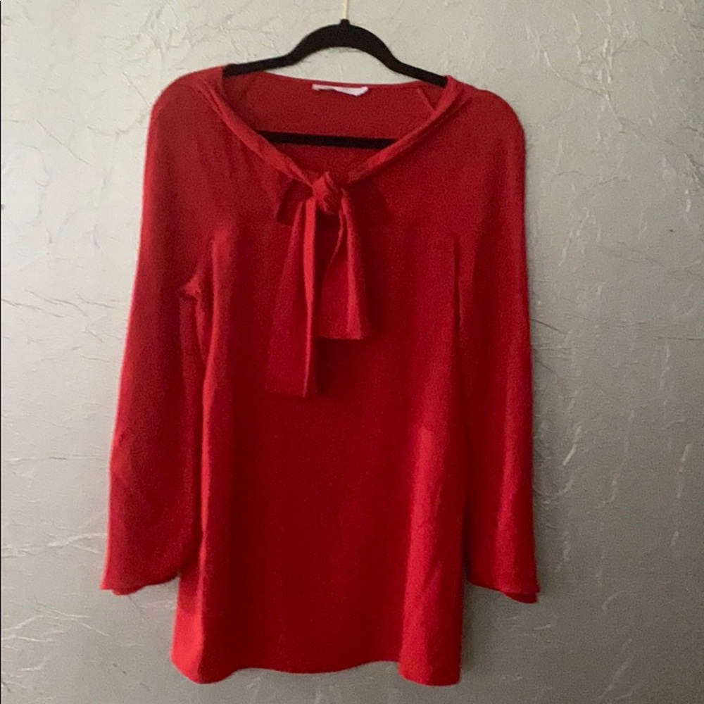 Beautiful red long sleeve top. Machine washable l